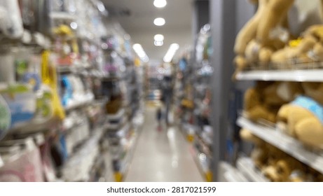 featuring a bokeh effect that renders the aisle of a retail store or supermarket blurred. Suitable as a background depicting concepts such as shopping, consumers, business, lifestyle, and commercial spaces.