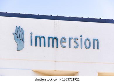 Feb 18, 2020 San Jose / CA / USA - Immersion Logo At The Headquarters In Silicon Valley; Immersion Corporation Is A Developer And Licensor Of Touch Feedback Technology, Also Known As Haptic Technology