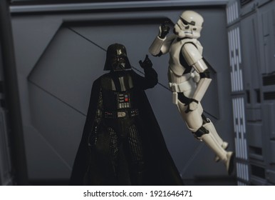 FEB 20 2021: Star Wars Sith lord Darth Vader force choking a disobedient Stormtrooper - Hasbro action figure