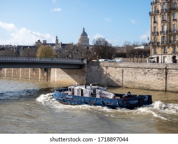 February 17, 2020. Paris, France. Police Boat On The River Seine In Paris. Full Speed Ahead