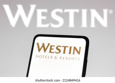 February 17, 2022, Brazil. In This Photo Illustration The Westin Hotels And Resorts Logo Seen Displayed On A Smartphone And On The Background