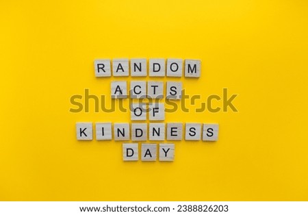 February 17, Random Acts of Kindness Day, a minimalistic banner with an inscription in wooden letters