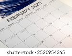 February 2025 calendar taken from a side angled view