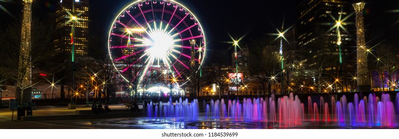 February 21, 2018. SkyView Ferris Wheel In Centennial Park At Night. Atlanta, Georgia, USA. Panoramic Image.