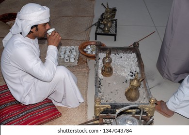 February 23, 2019 - Abu Dhabi, UAE: Young Local Emirati Man Drinking Tradition Tea Of UAE