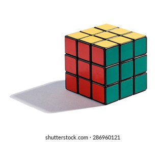 February 24, 2014 - Milan, Lombardy, Italy : Solved Rubiks Cube Puzzle On White Table With Each Color On Its Allotted Side Of The Cube