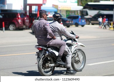 February 27, 2018, Dominican Republic, City of Sosua: Two policemen riding a motorcycle