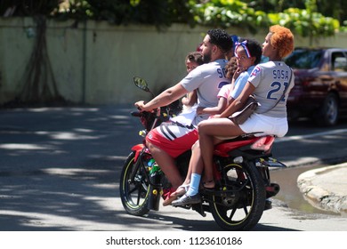 February 27, 2018, Dominican Republic, City Of Sosua: The Family Rides A Motorcycle