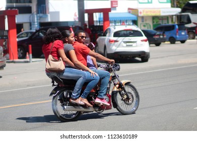 February 27, 2018, Dominican Republic, City Of Sosua: The Family Rides A Motorcycle