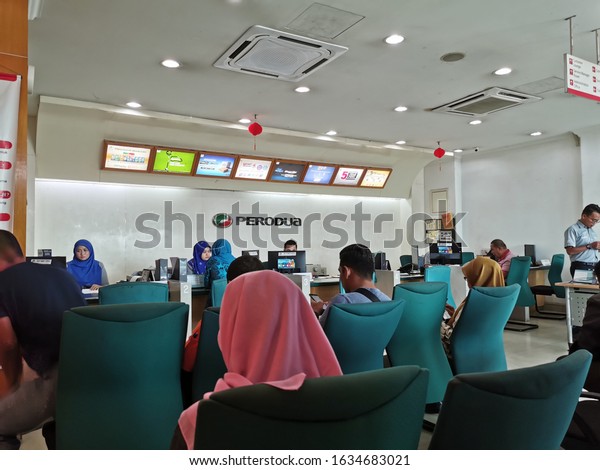 February\
4, 2020 - Klang, Malaysia. Local car service centre where customers\
were waiting for their turn to be entertained\
