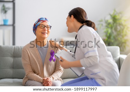 February 4 World Cancer Day. Female patient listening to doctor in medical office. Raising knowledge on people living with tumor illness. Stockfoto © 