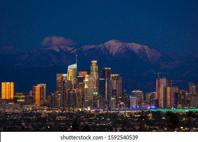 FEBRUARY 6, 2019 - LOS ANGELES, CA, USA - "City of Angeles" - Los Angeles Skyline framed by San Bernadino Mountains and Mount Baldy with fresh snow from Kenneth Hahn State Park