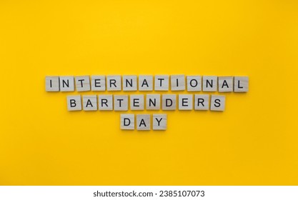 February 6, International Bartenders Day, minimalistic banner with the inscription in wooden letters - Powered by Shutterstock