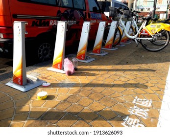 February 9, 2021, Kaohsiung, Taiwan: Next To The Rented Bicycles, There Are Piles Of Rubbish Littered By Users. There Is No Morality And Damage To The Environment. (Commonly Known As YouBike Or UBike)