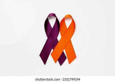 February awareness month campaign with purple and orange ribbon - Shutterstock ID 2101799194