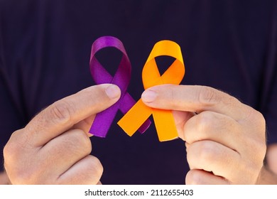 February awareness month campaign with purple and orange ribbon - Shutterstock ID 2112655403