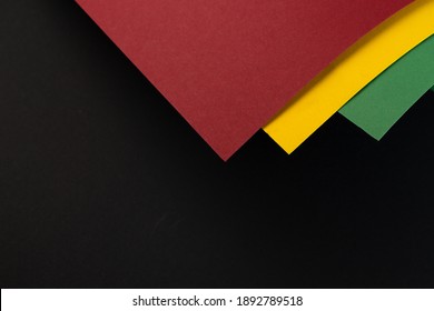 February Black History Month. Abstract Paper geometric black, red, yellow, green background. Copy space, place for your text. Top view. - Shutterstock ID 1892789518