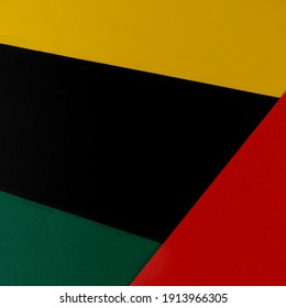 February Black History Month. Abstract Paper geometric black, red, yellow, green background. Copy space, place for your text.
