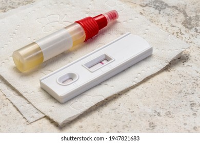 Fecal Immunochemical Test For  Colorectal Diseases - Home Kit With A Collecting Tube And A Negative Result On A Test Cassette, Health And Self Care Concept