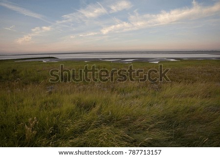 Similar – Lahnungen coastline barge