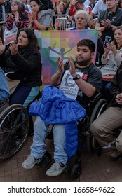 Federal Capital, Buenos Aires, Argentina - September 1, 2017: A Man In A Wheelchair With A Photo Of Santiago Maldonado At Mobilization For Justice During The First Month Of Forced Disappearance Of Him