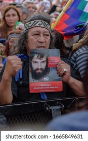 Federal Capital, Buenos Aires, Argentina - September 1, 2017: An Aborigine With A Photo Of Santiago Maldonado At Mobilization For Justice Cause Forced Disappearance Followed By The Death Of Him