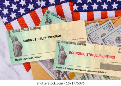 Federal Cash Incentive Coronavirus COVID-19 Individual Checks From Government US 100 Dollar Bills Currency On American Flag GLOBAL Pandemic US Lockdown