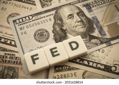 The Federal Reserve ( FED ) to control interest rates. World economy crisis, U.S. vs China trade or currency war concept. Interest rates affect the ability of consumers or businesses to access credit. - Shutterstock ID 2031628814