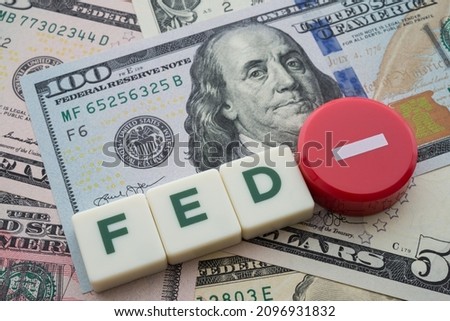 The Federal Reserve ( FED ) cuts low interest rates. World economy crisis, U.S. vs China trade or currency war concept. Fed cuts key interest rates nesr zero, citing coronavirus.