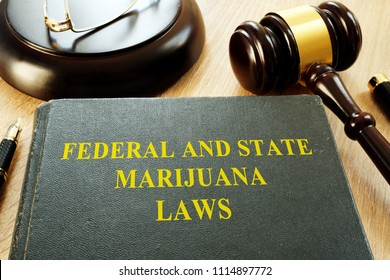 Federal And State Marijuana Laws And Gavel In A Court.