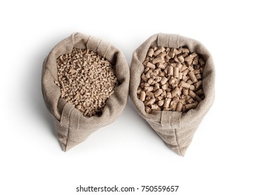 Feed For Livestock. Two Types Of Pellets In Bags