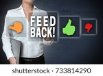 Feedback and thumb touchscreen is shown by businesswoman.