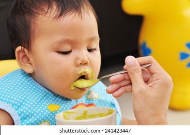 Feeding Baby Food To Baby