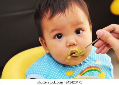 Feeding Baby Food To Baby