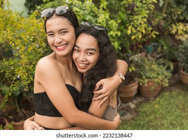 Feel good scene of two best friends hugging each other. Appreciating and cherishing their long years of friendship. - Shutterstock ID 2232138447