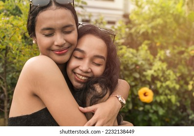 Feel good scene of two best friends hugging each other. Appreciating and cherishing their long years of friendship. - Shutterstock ID 2232138449