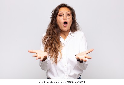  feeling extremely shocked and surprised, anxious and panicking, with a stressed and horrified look