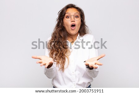  feeling extremely shocked and surprised, anxious and panicking, with a stressed and horrified look