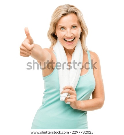 Feeling fit and frisky. a mature woman giving the thumbs up against a studio background.