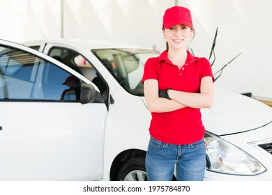 Feeling Proud Of My Work At The Car Wash. Portrait Of A Beautiful Female Worker Smiling And Taking A Break From Her Job At The Auto Detail Service