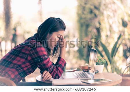 Image, Stock Photo Frustration in garden office | man sits at table in front of laptop and holds hands in front of face