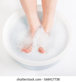 Feet Of Boy In Foot Bath