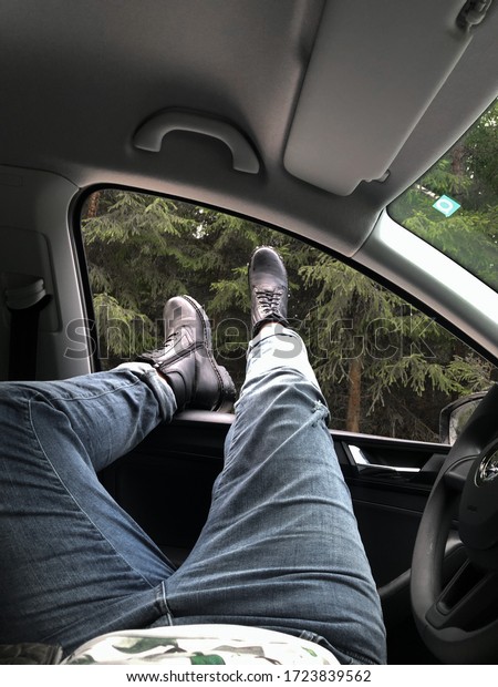 Feet in the car\
window