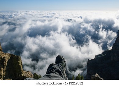 Feet and clouds on the sky - Powered by Shutterstock