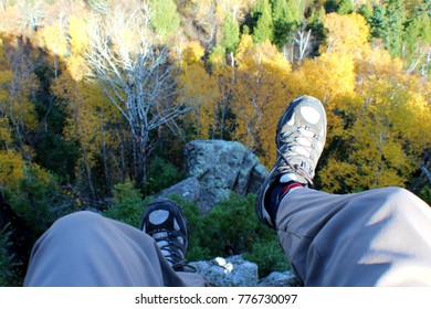 Feet Dangling Over Cliff Above Autumn Stock Photo 776730097 | Shutterstock