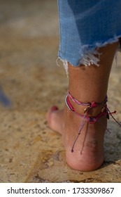 Feet And Foot With Accesories In The Pool Or Water