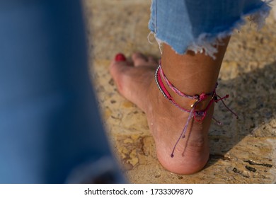 Feet And Foot With Accesories In The Pool Or Water