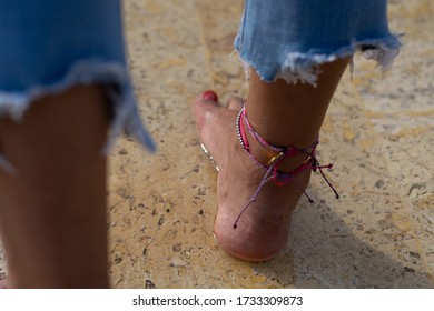 Feet And Foot With Accesories In The Pool Or Water