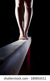 Feet Of Gymnast On Balance Beam  