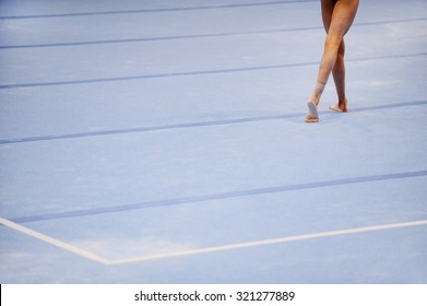 Feet Of Gymnast Are Seen On The Floor Exercise During Gymnastics Competition